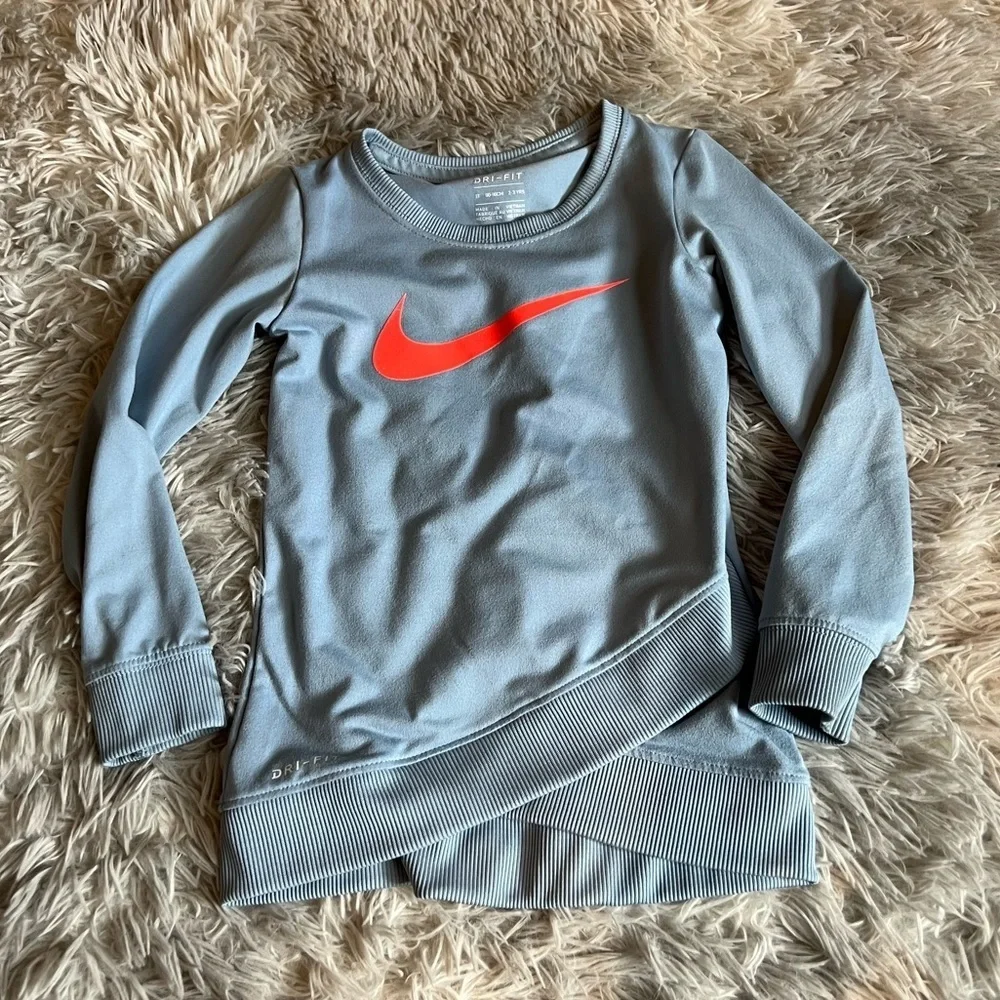 Girls Nike Dri-Fit blue sweatshirt with pink Swoosh